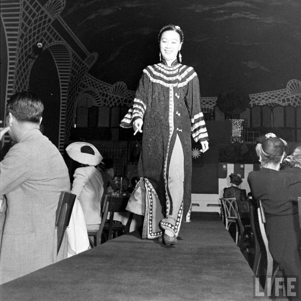 Li Ling-Ai models Chinese gown for United China Relief fundraiser in 1941