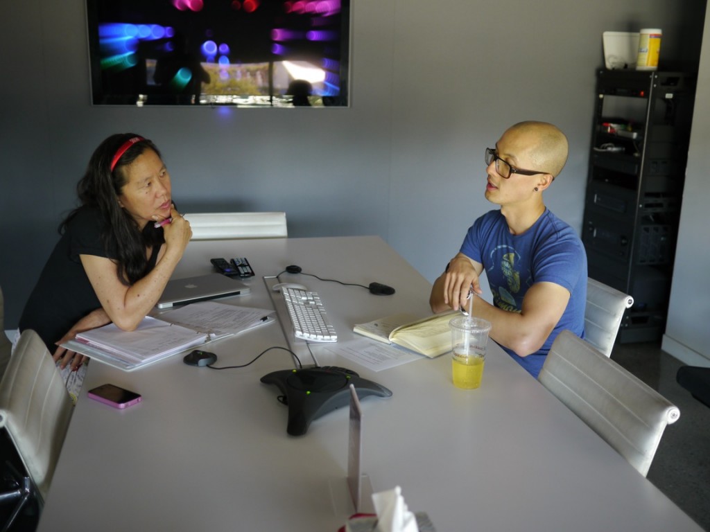 Chris Do helps Robin Lung lay out a plan of action for creating FINDING KUKAN's shadow scenes.