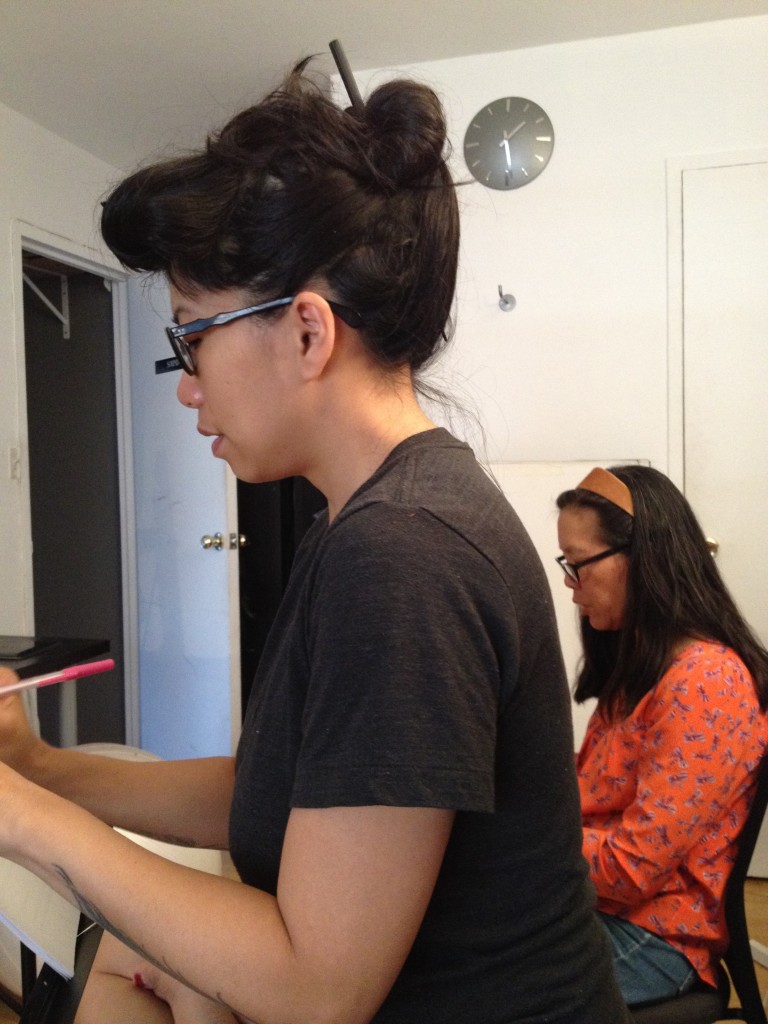 Going over scripts with Calamity Chang.